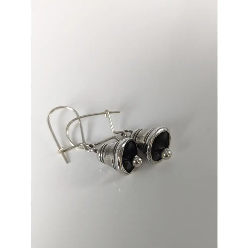 Silver steed bells dropped earrings are handmade silver earrings with a matte finish and small spherical accents