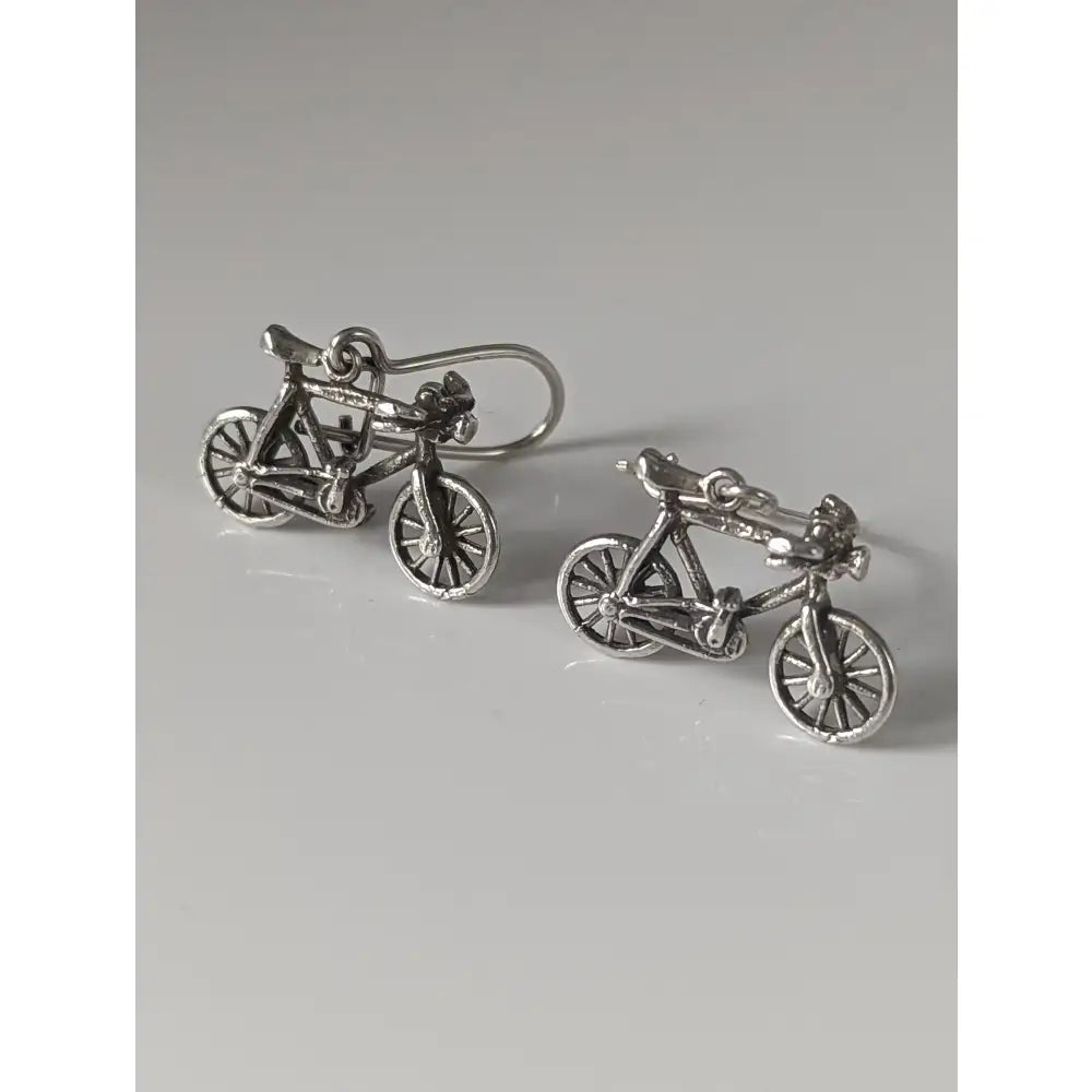 Silver steed bicycles handmade silver bicycles dropped earrings with intricate detailing and polished metallic finish