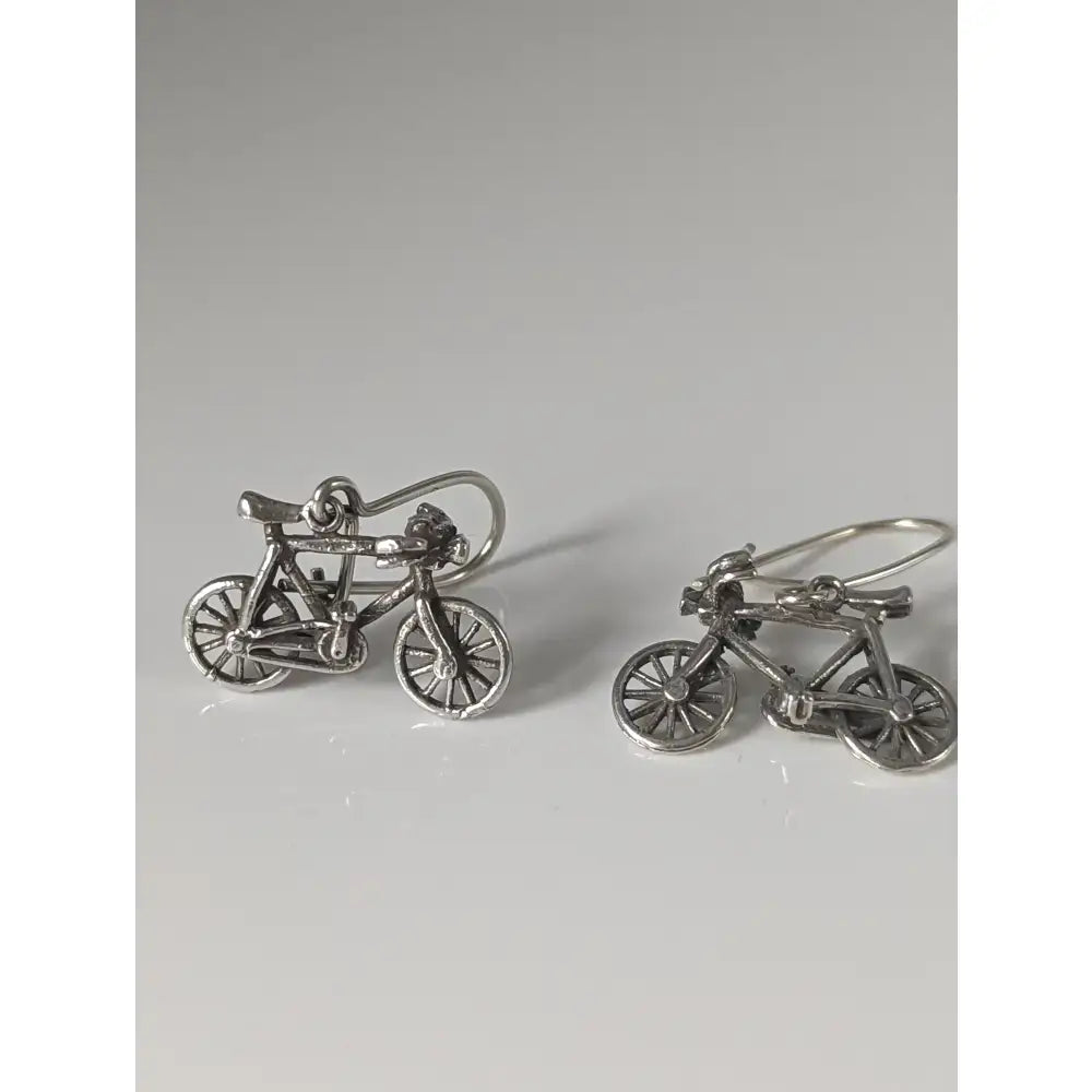 Silver steed bicycles handmade silver bicycles dropped earrings with intricate detailing and polished finish