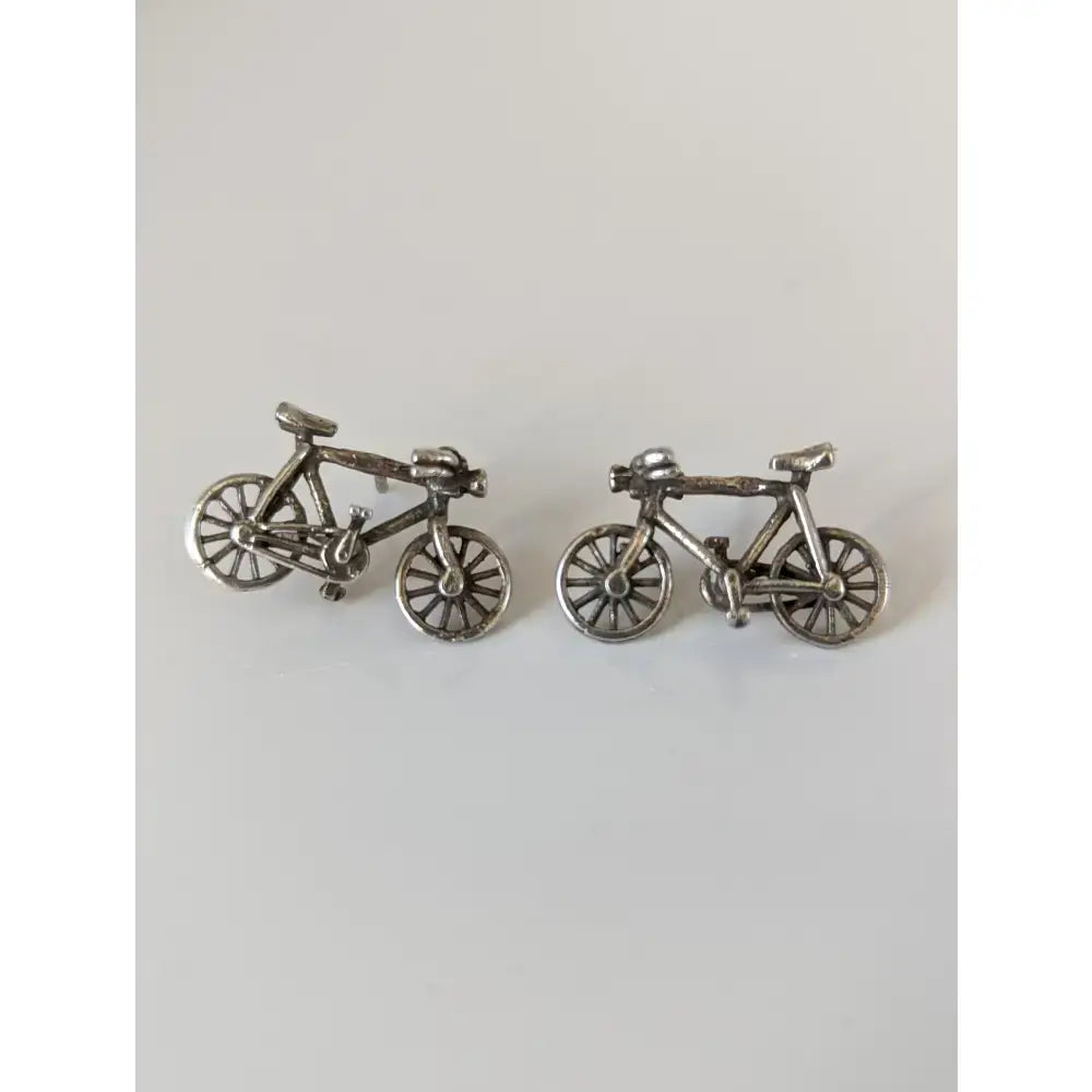 Silver steed bicycles stud earrings shaped like silver bicycles with detailed spokes and frame for stylish wear