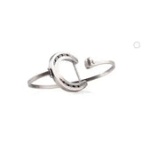 Silver steed big horseshoe bangle is a sleek silver cuff bracelet in sterling silver with a minimalist design