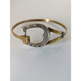Silver steed big horseshoe bangle featuring a two-tone sterling silver and gold metal bracelet design