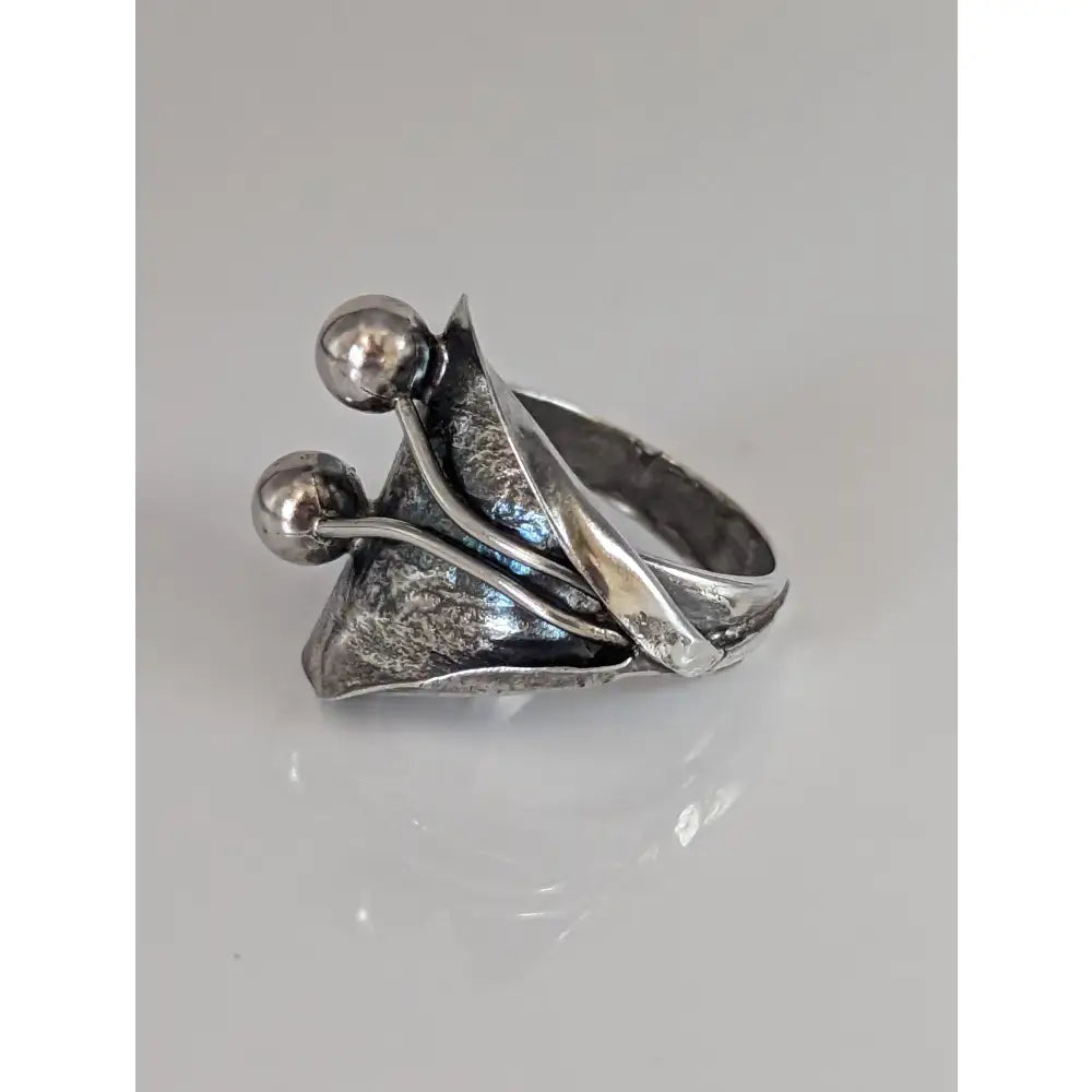 Silver steed big leaf sterling silver ring with textured leaf design and two polished spherical ornaments