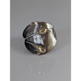 Silver steed big leaf ornament silver ring featuring a silver and gold-toned hammered sterling silver ring with teardrop accents