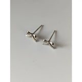 Silver steed bow stud earrings featuring a minimalist silver bow design perfect for everyday wear