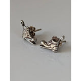 Silver steed broken boot stud earrings in silver shaped like roller skates with detailed lacing and toe caps