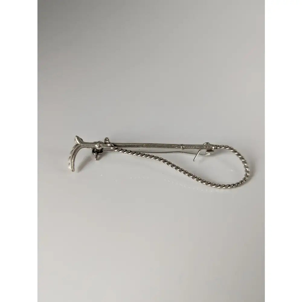 Silver steed cane brooch silver-toned metal tie bar with twisted rope chain and ornate curved handmade silver design