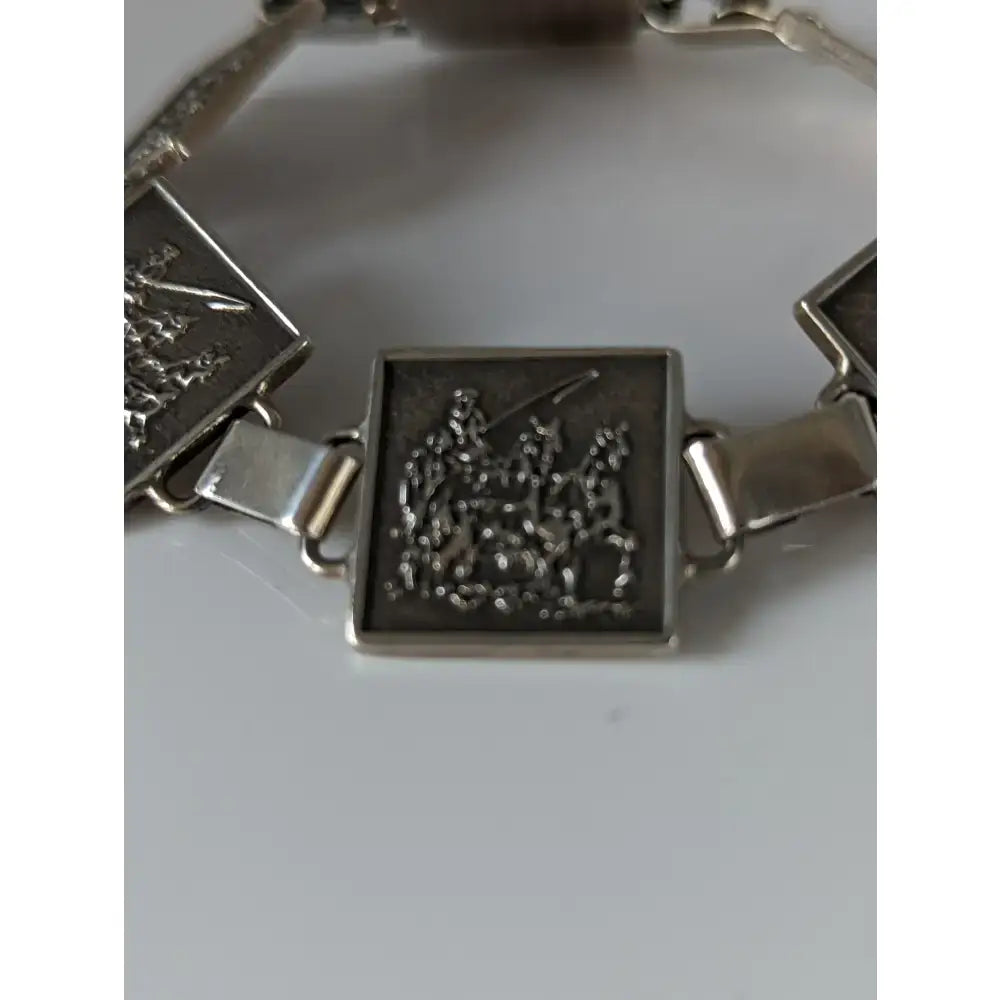 Silver steed carriage driving silver bracelet with solid silver snaffles and engraved medieval battle scenes on square links