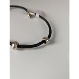 Black leather cord bracelet with silver steed silver charms textured bead charms and matching clasp on 26cm leather cord