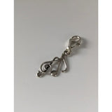 Silver steed clef and note silver charm in silver with treble clef design and lobster clasp for music lovers