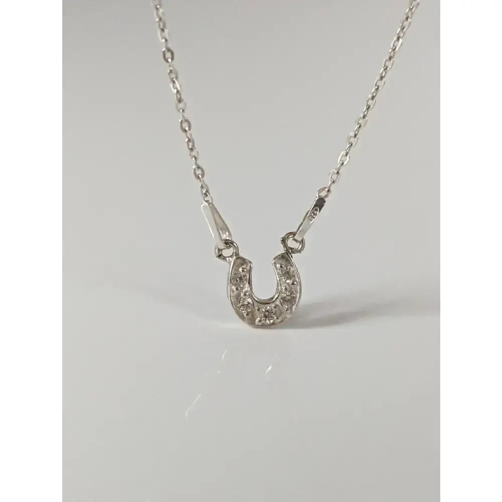 Silver steed crystal horseshoe necklace with sparkling clear crystals on a delicate silver pendant, perfect equestrian jewelry
