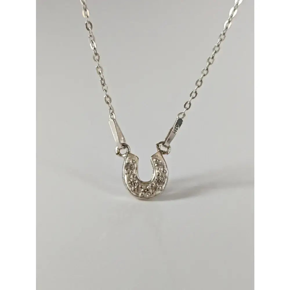 Delicate silver steed crystal horseshoe necklace with sparkling clear stones perfect as equestrian jewelry