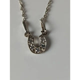 Silver steed crystal horseshoe necklace with clear rhinestones on silver pendant in stylish equestrian jewelry design