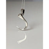 Silver steed curved horseshoe nail silver pendant with hammered texture and rustic engraved mark in silver tone