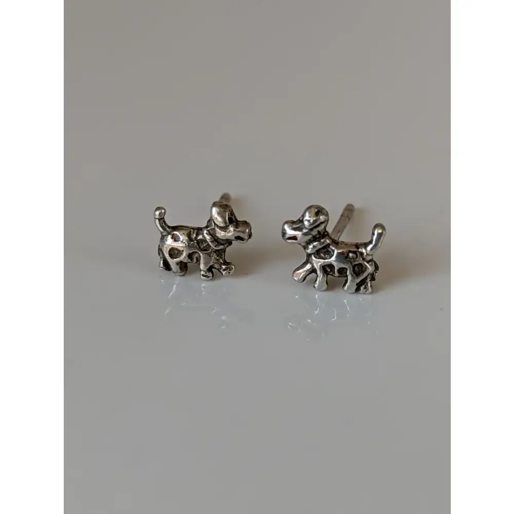 Silver steed dalmation silver stud earrings featuring playful detailed design in shiny silver stud earrings style