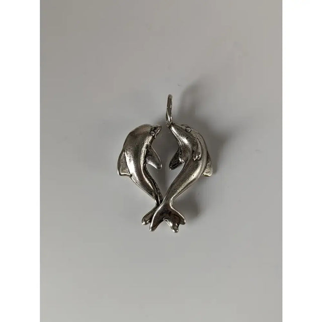 Silver steed dancing dolphins silver pendant featuring two detailed metal dolphins in a heart-shaped pose