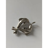 Silver steed dancing dolphins silver pendant featuring two polished metal dolphins leaping in a dynamic pose