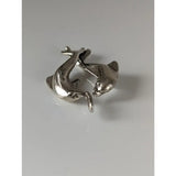 Silver steed dancing dolphins silver pendant featuring a detailed silver dolphin charm with a small attachment loop