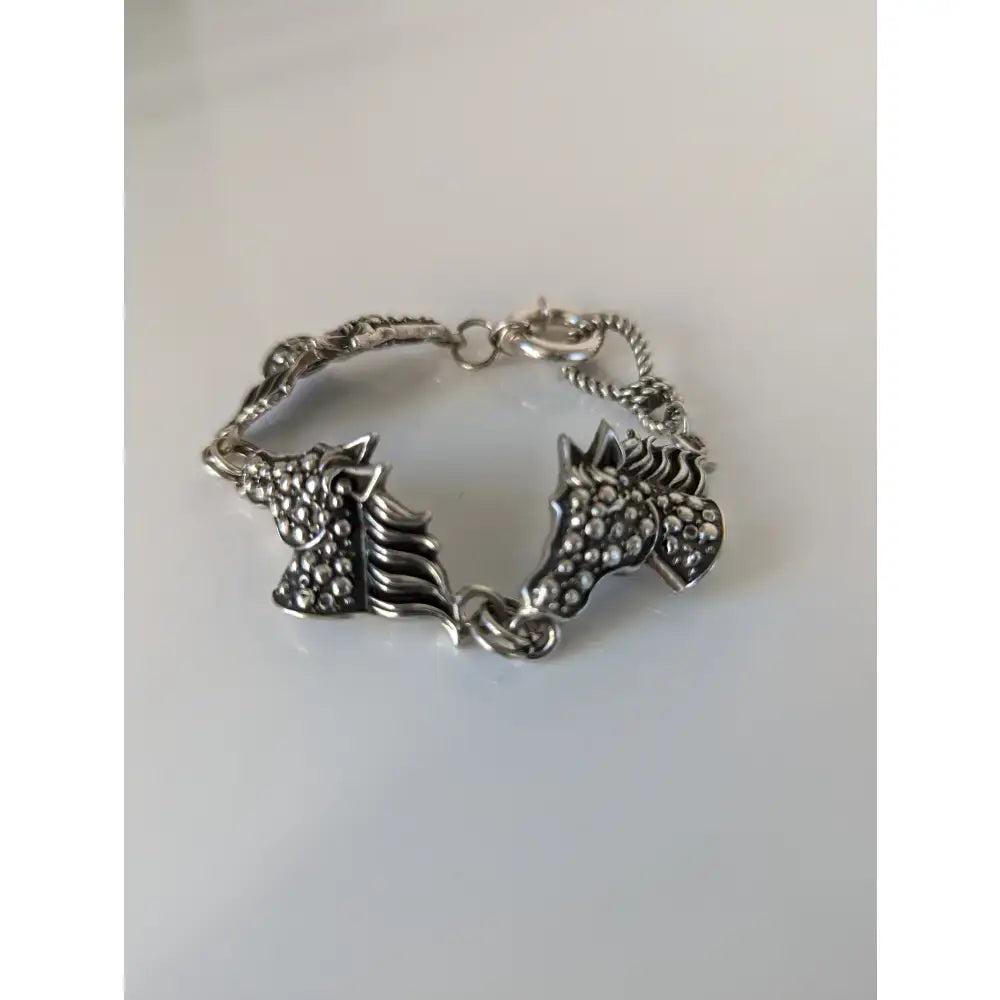 Silver steed dappled silver horse bracelet with two horse heads and sparkling marcasite stones in silver
