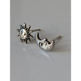 Silver steed day and night stud earrings featuring detailed silver sun and crescent moon night stud earrings