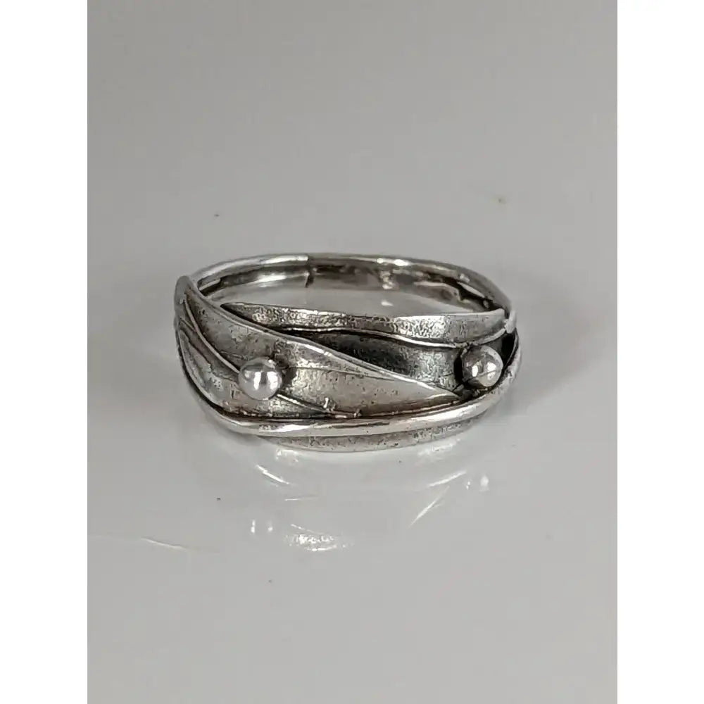 Silver steed delicate silver leaves ring with textured leaf-like bands and two silver buds accents
