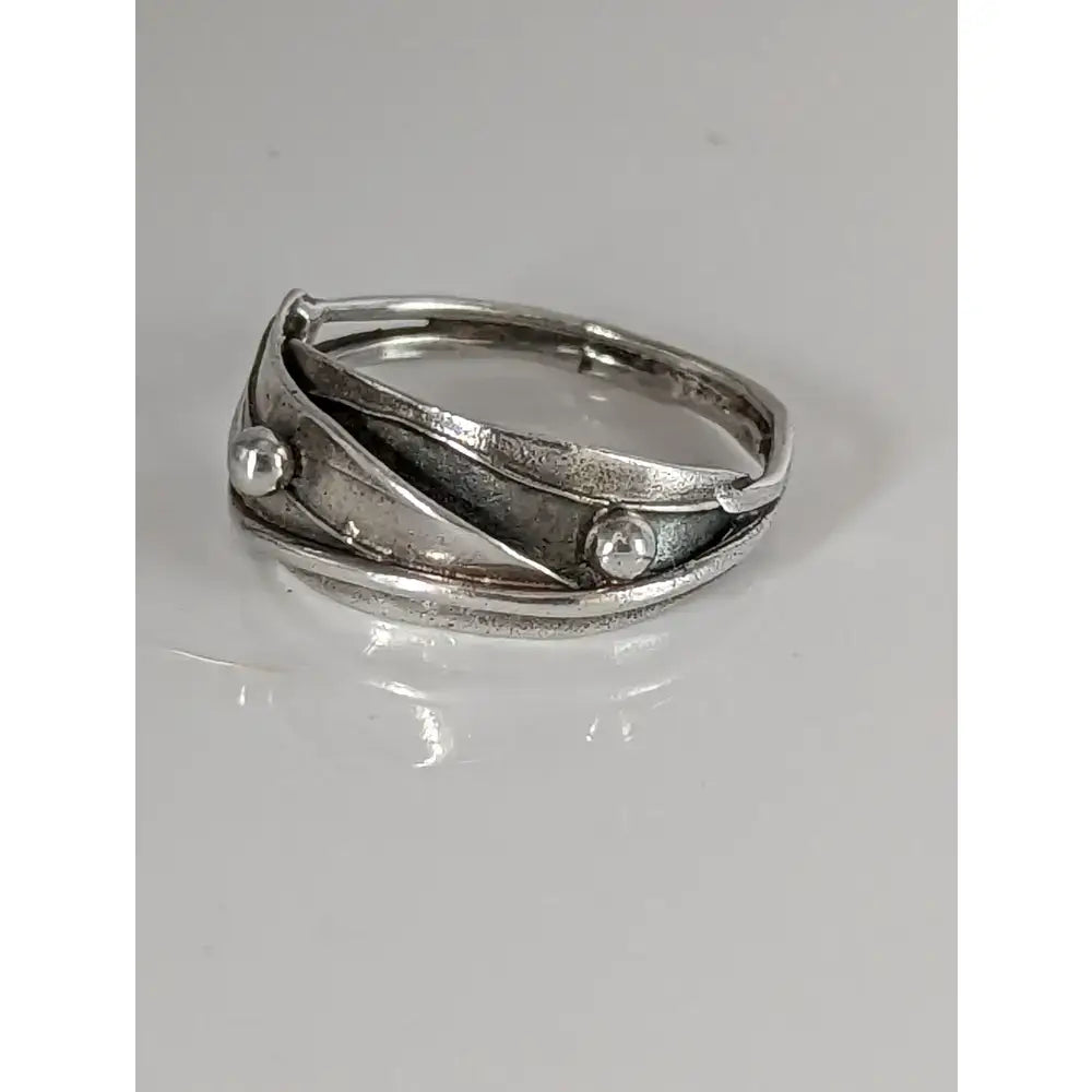 Silver steed delicate silver leaves ring with textured layers and silver buds in a stylish silver leaves ring design