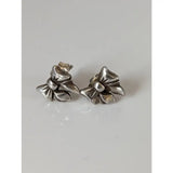 Silver steed detailed bow stud earrings with a textured metallic finish in shiny silver metal