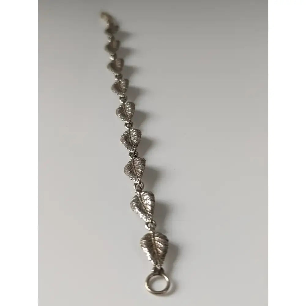 Silver steed detailed leaf silver bracelet featuring intricate silver detailing and a secure clasp