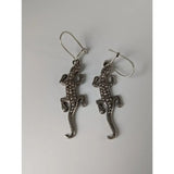 Silver steed detailed lizard silver dropped earrings with textured dotted surface and hook clasps