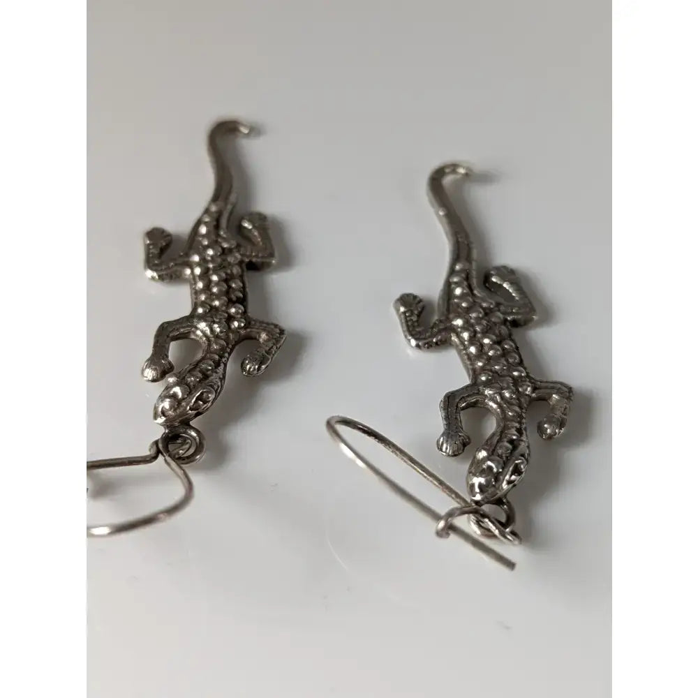 Silver steed detailed lizard silver dropped earrings with textured scales and hook closures in silver dropped earrings style