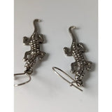Silver steed detailed lizard silver dropped earrings with textured scales and hook closures in silver dropped earrings style
