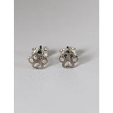 Silver steed silver sterling silver dog paws stud earrings with minimalist cut out design in silver color