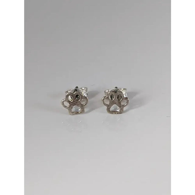 Silver steed silver sterling silver dog paws stud earrings with polished finish and intricate cut-out design