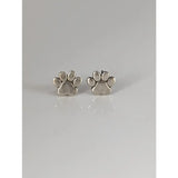 Silver steed sterling silver stud earrings featuring polished silver dog paws with a shiny metallic finish
