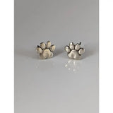 Silver steed sterling silver dog paws stud earrings with rustic textured finish in silver paw print design