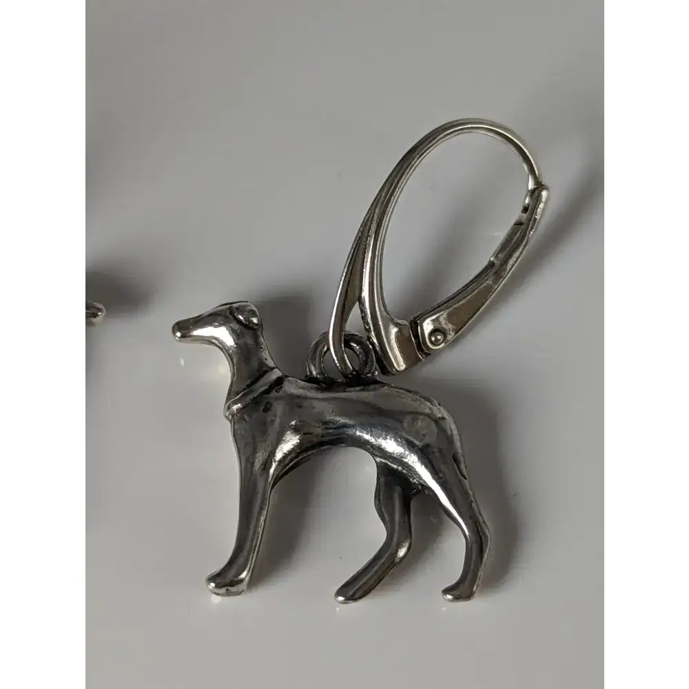Silver steed dropped greyhound earrings featuring sleek silver dog-shaped charm with lever-back hook for easy wear