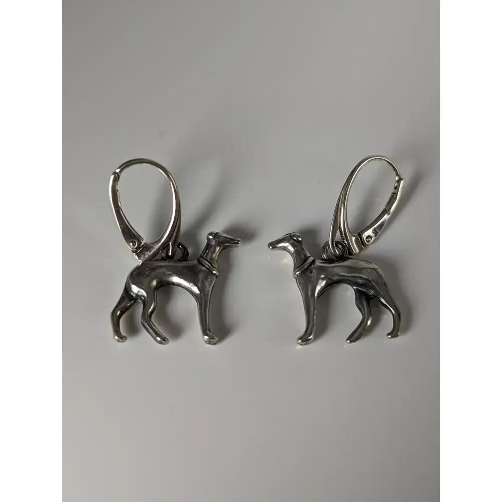 Silver steed dropped greyhound earrings silver dog-shaped dropped greyhound earrings with polished finish and lever-back closures