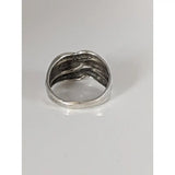 Silver steed ear grain silver ring with a textured sculptural design featuring intertwined silver-toned bands