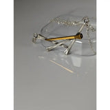 Silver steed elegant hoof nails necklace with silver and gold nail pendant on a chain