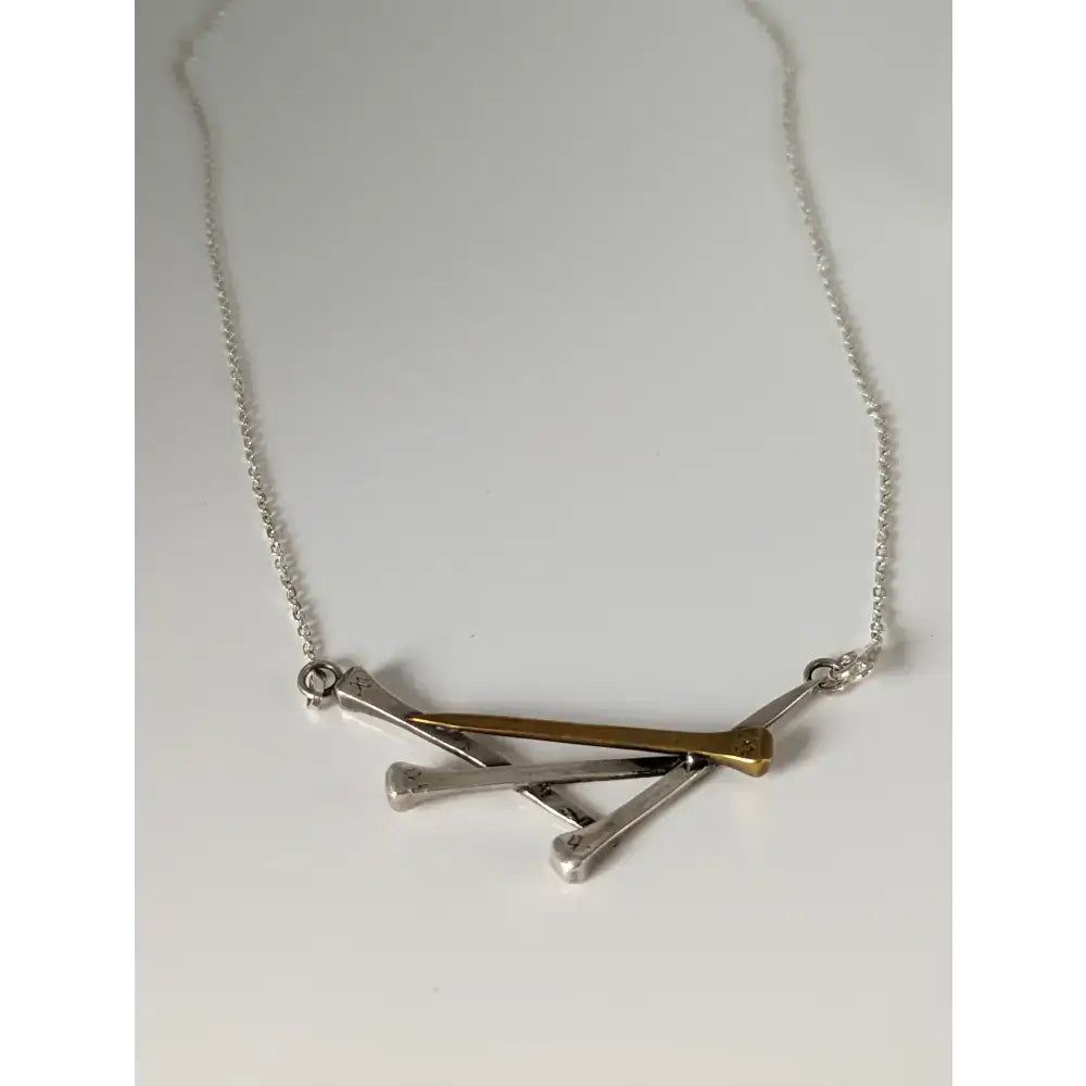 Silver steed elegant hoof nails necklace with a silver and gold toned geometric metal pendant