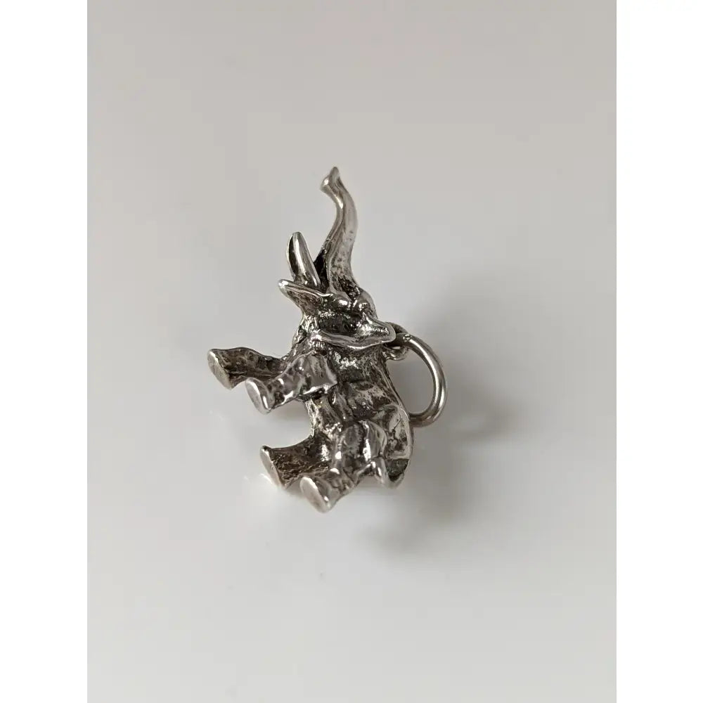 Silver steed elephant silver pendant with textured surface and small ring perfect for equestrian jewelry fans