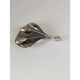 Silver steed extravagant silver pendant with textured leaf shape and two polished teardrop stems silver pendant accents