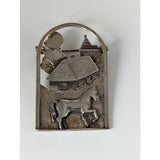 Silver steed farm yard silver brooch with a detailed horse relief and house framed by an arched silver brooch border