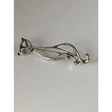 Silver steed feline silver brooch with flowing art nouveau curves and intricate filigree detailing in silver
