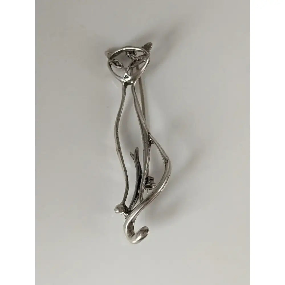 Silver steed feline silver brooch with intricate wire-formed cat design in a shiny silver tone perfect as a feline silver brooch