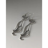Silver dropped earrings featuring a sleek silver steed feline silver design with a polished metallic finish