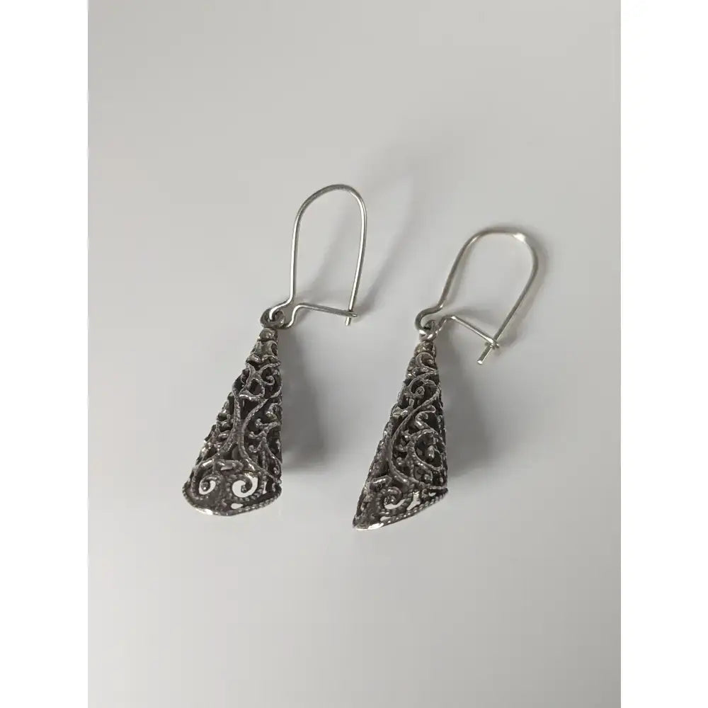 Silver steed filigree handmade silver cone dropped earrings with intricate swirling patterns and classic hook closure