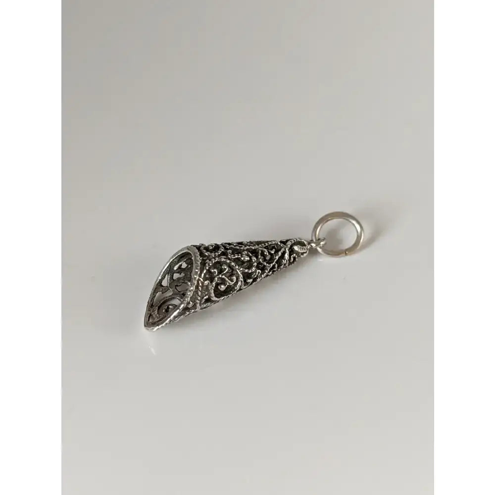 Silver steed filigree cone silver pendant with intricate swirling patterns perfect for equestrian jewelry lovers