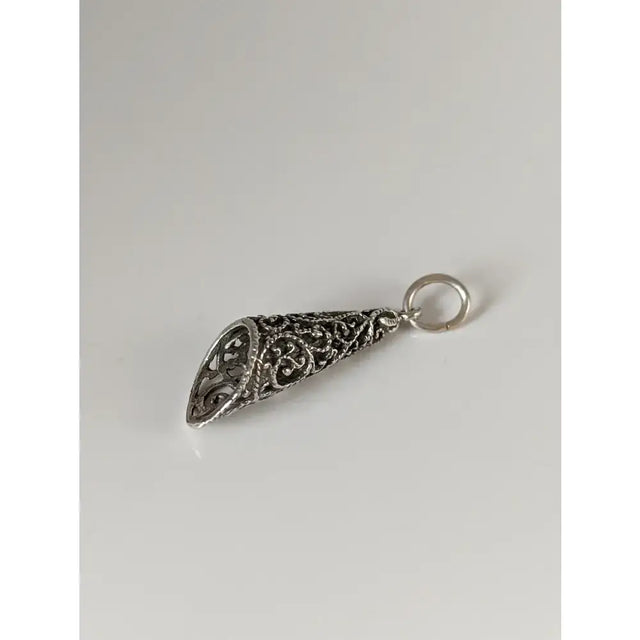Silver steed filigree cone silver pendant with intricate swirling patterns perfect for equestrian jewelry lovers