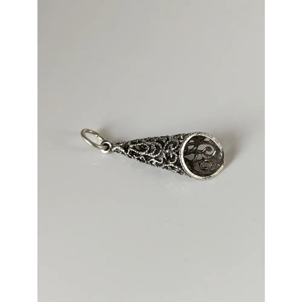 Silver steed filigree cone silver pendant with intricate swirling patterns perfect for equestrian jewelry lovers